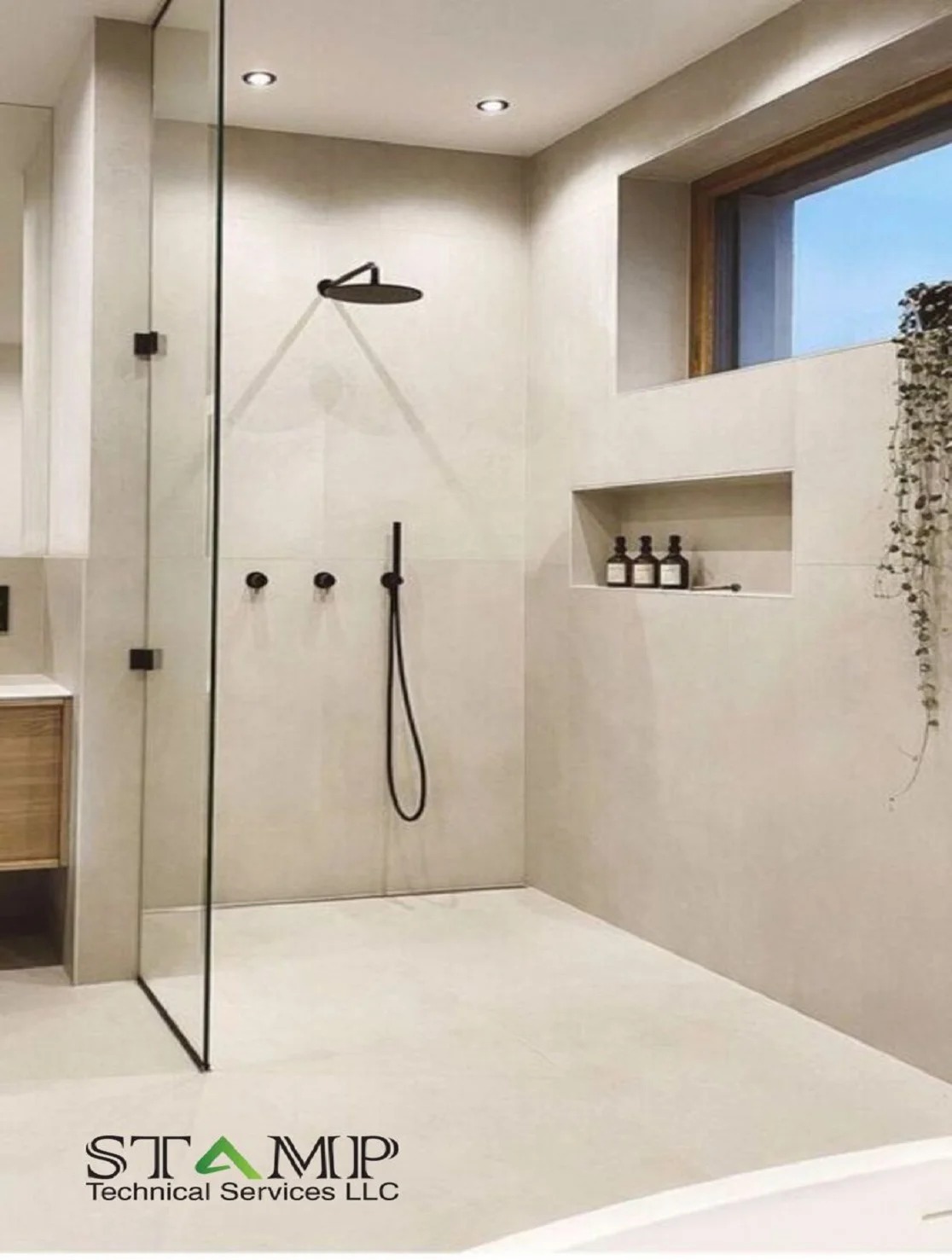 Pebble mirror with backlight over floating vanity