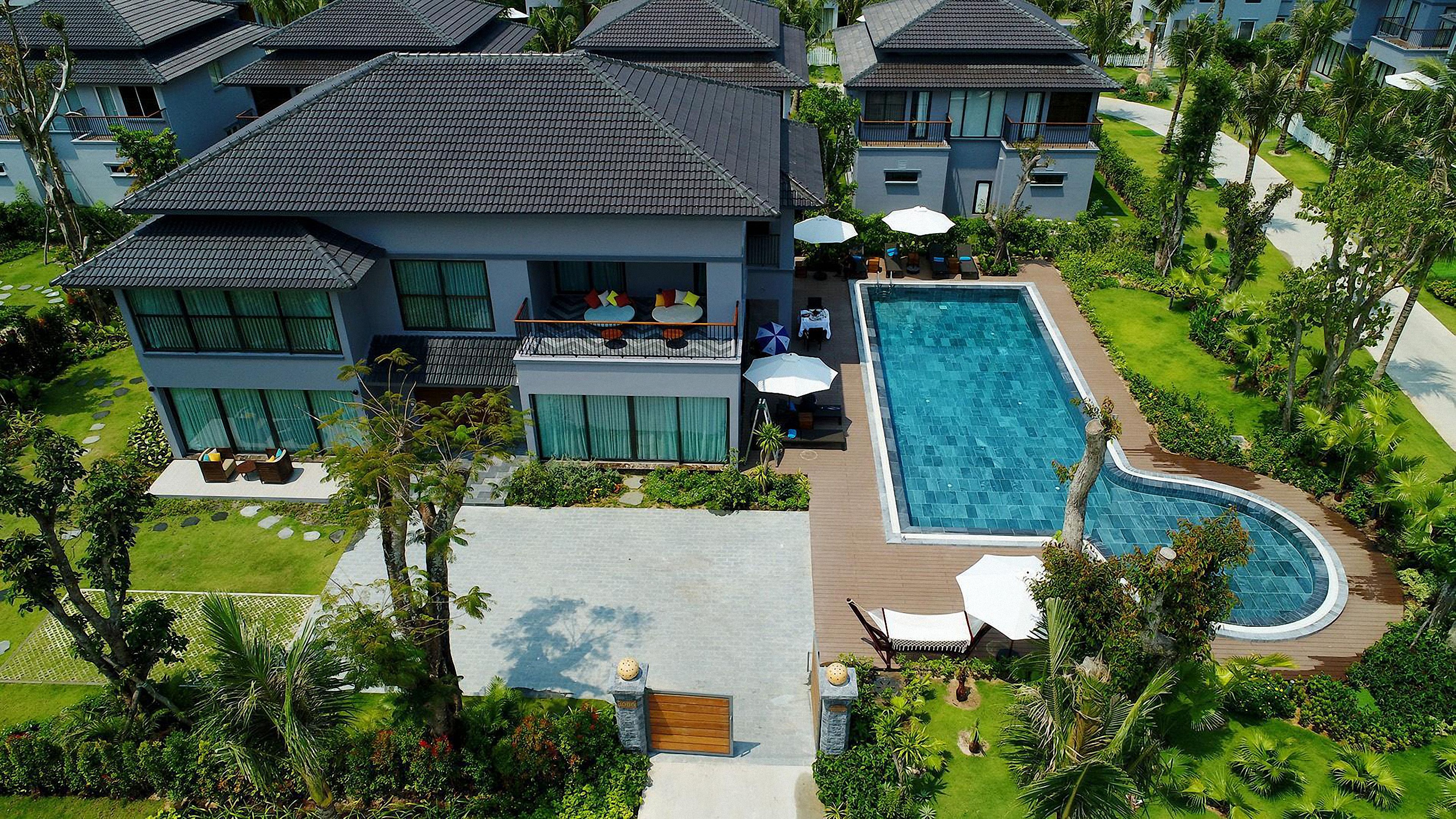 Desert-style villa with pool and stone walls in Dubai
